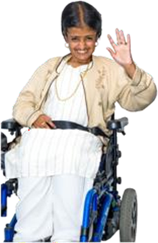 Indian lady in wheelchair waving and smiling