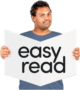 Man holding a sign saying 'easy read'