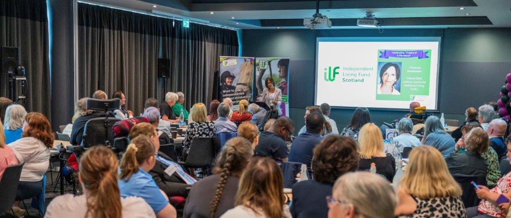 A shot of the event room and presentation screen.