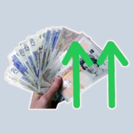 Hand holding money with two green arrows pointing up