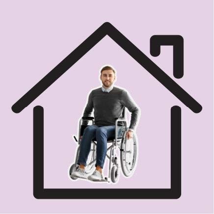 Man in wheelchair in cartoon house.