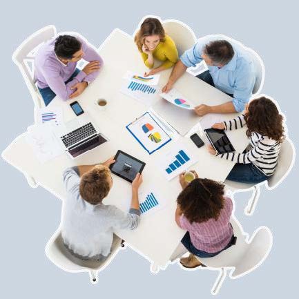 A group of people meeting at a table.
