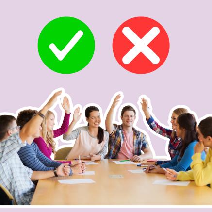 A group of people meeting around a table and voting with their hands in the air. Green tick red cross appear at the top of the image.