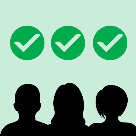Three silhouettes of the heads of people with green ticks above each of their heads.