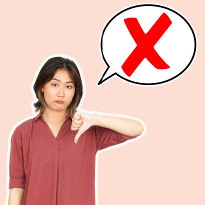 Woman looking sad with her thumbs down. A red cross x is in a speech bubble above her head.