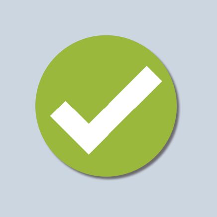 Big white tick in a green circle