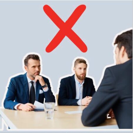 Two men on one side of the table - one on the other. They wear suits. A big red X cross sits above them.